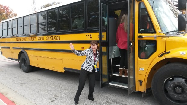 Fiona with the school bus at a school she worked with